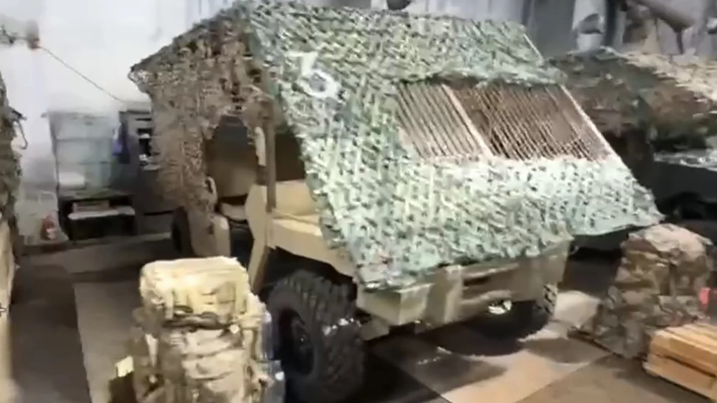 Side profile of cage armor on military vehicle