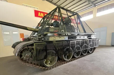 Welded armor assembly on military vehicle