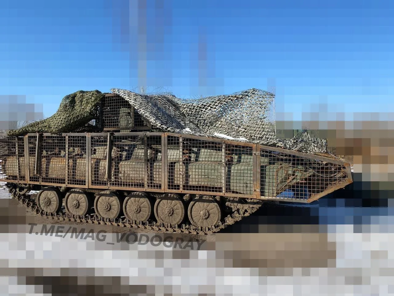 Military vehicle equipped with cope cage armor on battlefield demonstrating anti-drone protection