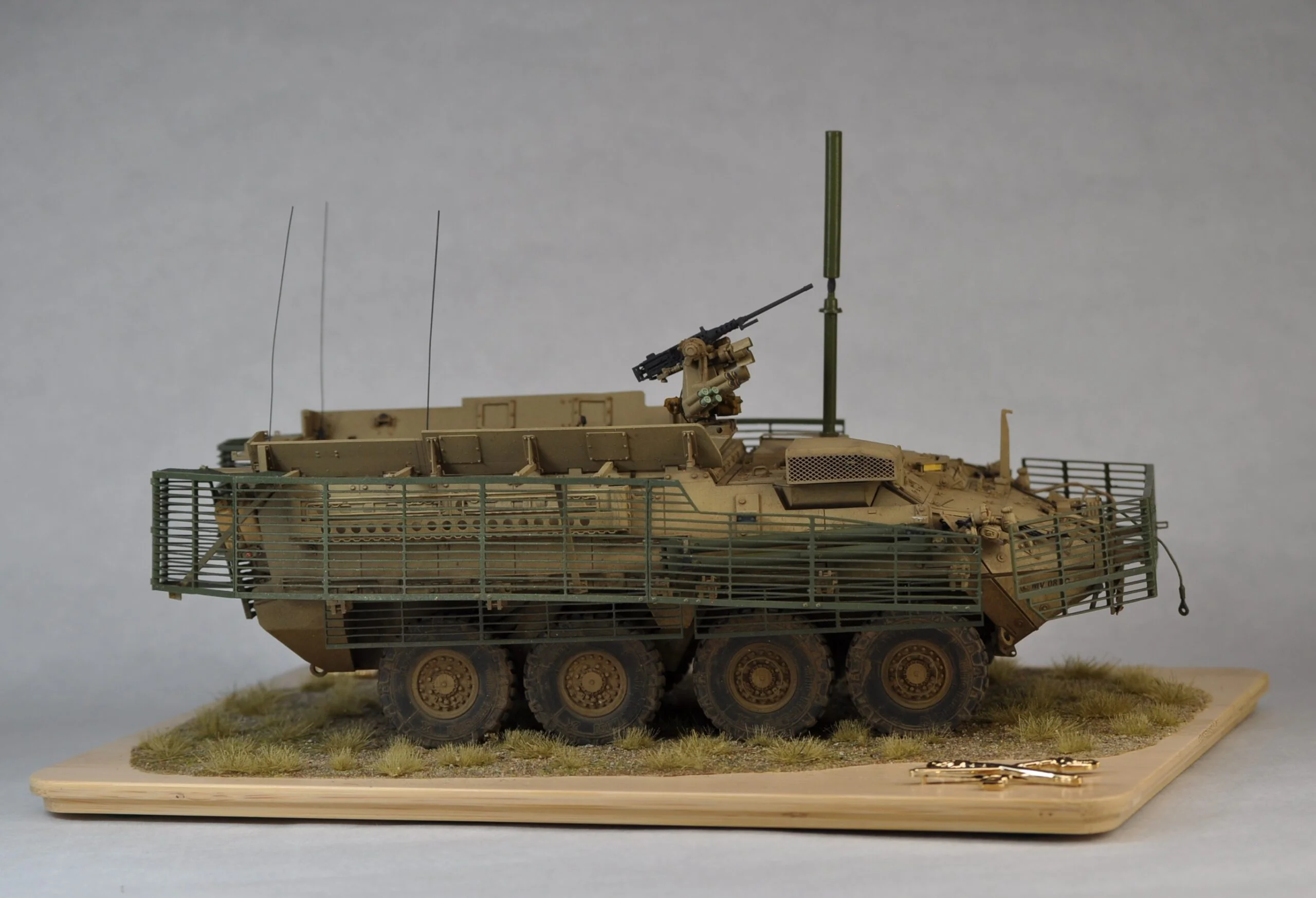 Welded armor cage installation on military vehicle